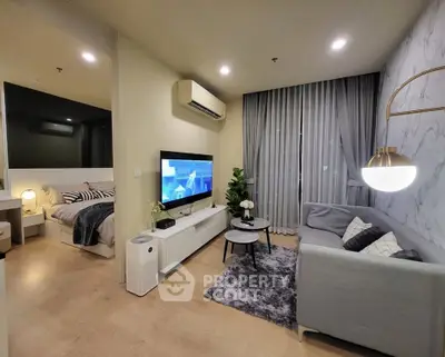 Modern living room with stylish decor and cozy ambiance in a contemporary apartment.