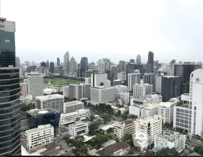 Stunning cityscape view of modern skyscrapers and urban skyline, perfect for real estate investment.