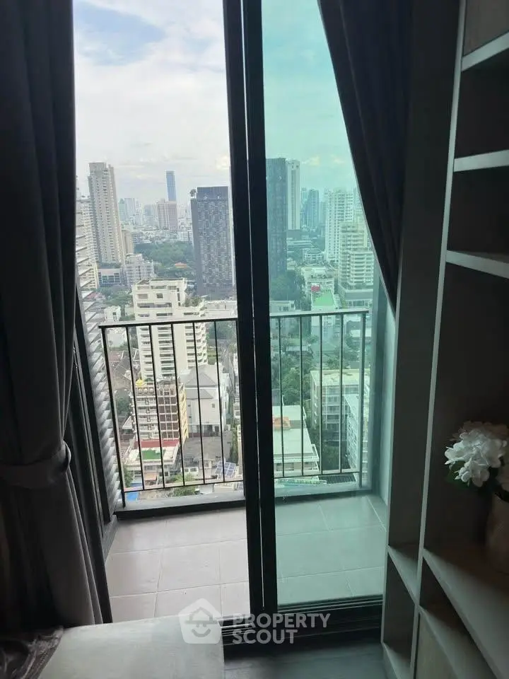 Stunning city view from modern high-rise apartment balcony