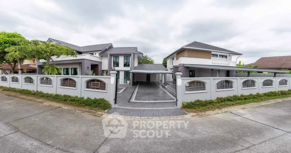 Luxurious modern house with spacious driveway and elegant architecture