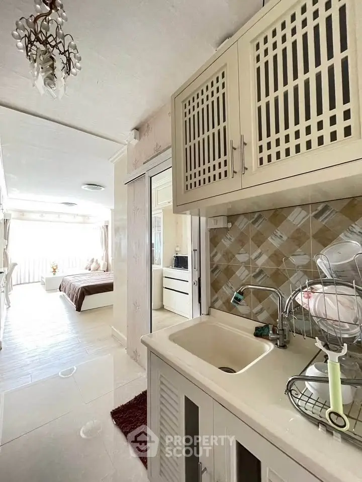 Charming studio apartment with open kitchen and cozy bedroom area