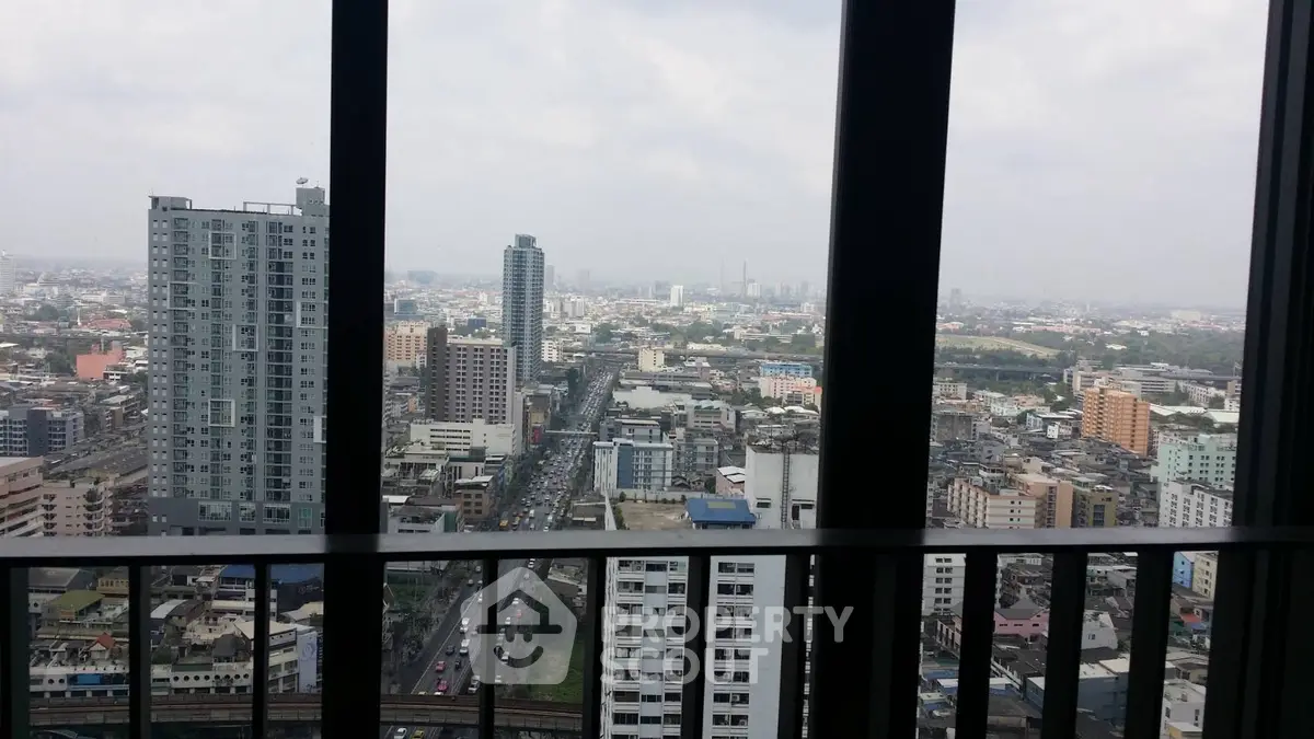 Stunning cityscape view from high-rise building balcony