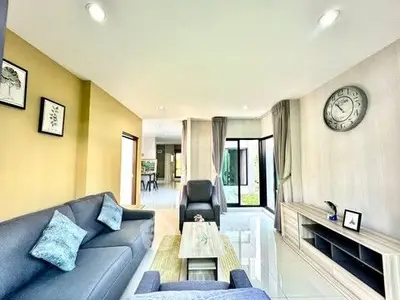 Spacious modern living room with elegant decor and natural light