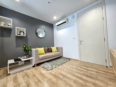 Modern living room with stylish decor and wooden flooring