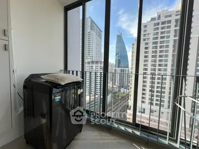 Modern high-rise balcony with city view and washing machine