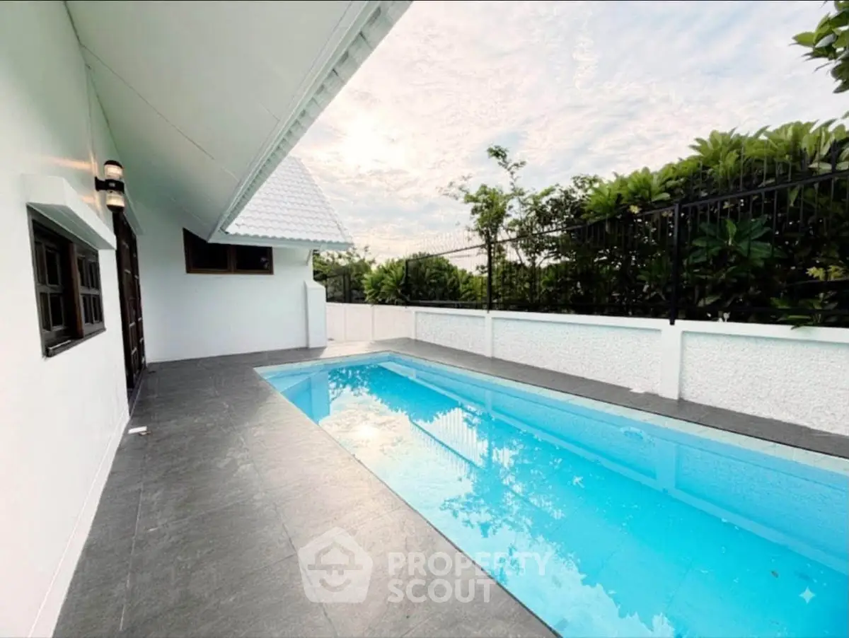 Charming property with a private pool and lush greenery, perfect for relaxation and entertainment.