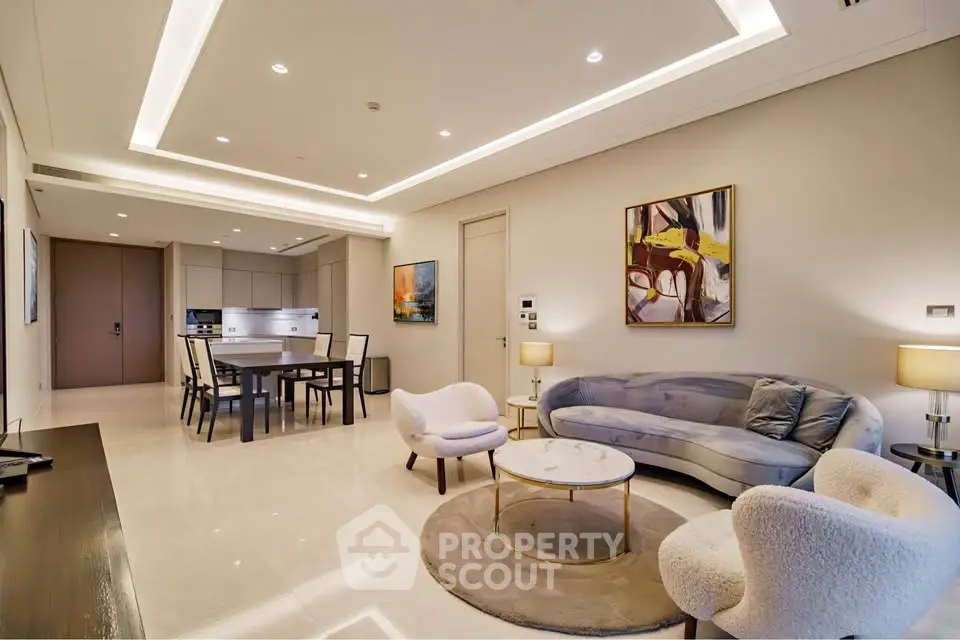 Luxurious modern living room with elegant furniture and open kitchen layout