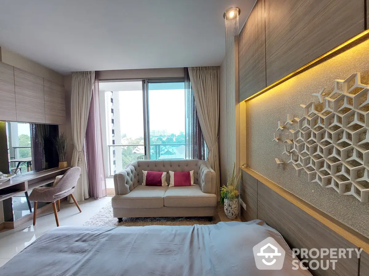 Luxurious bedroom with modern design, elegant furnishings, and a serene balcony view, perfect for upscale urban living.