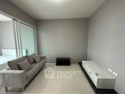 Modern minimalist living room with sleek furniture and neutral tones