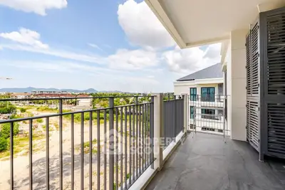 Spacious balcony with scenic view in modern apartment building