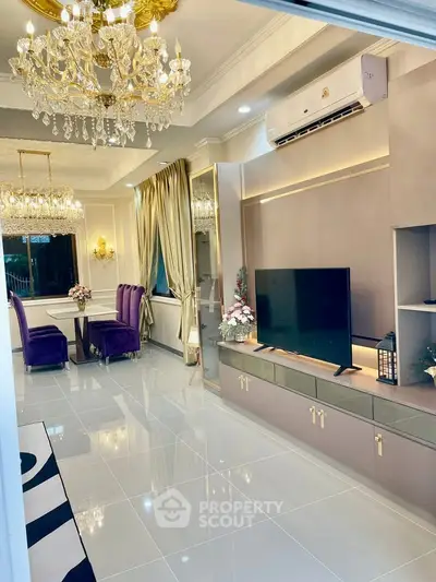 Luxurious living room with elegant chandelier and modern decor