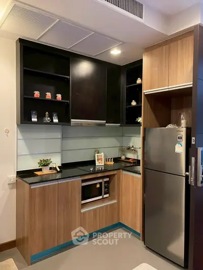 Modern kitchen with sleek cabinets and stainless steel appliances