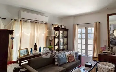 Cozy living room with natural light and elegant decor