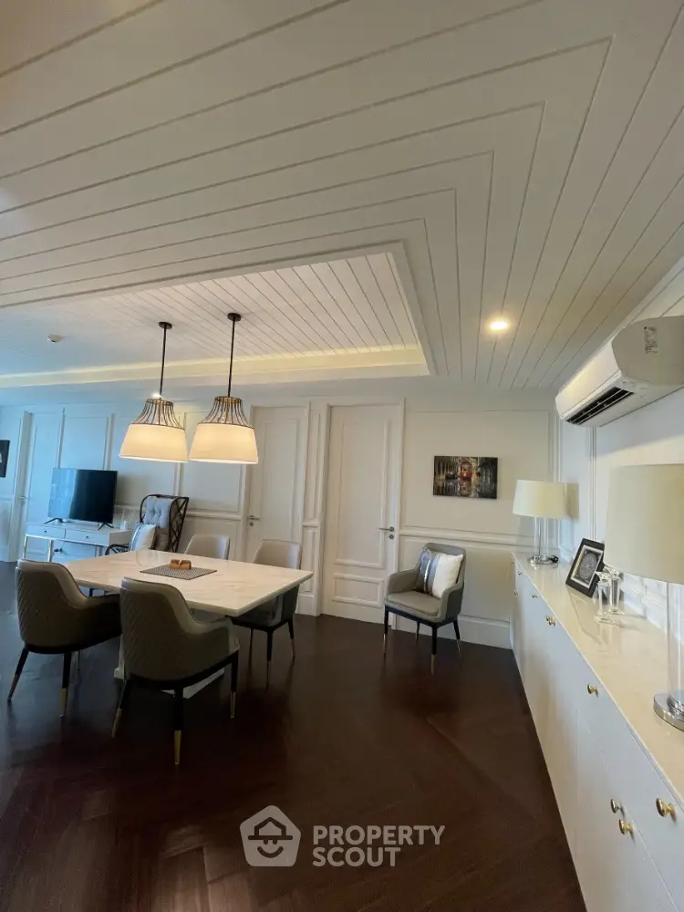 Elegant dining room with modern decor and stylish lighting