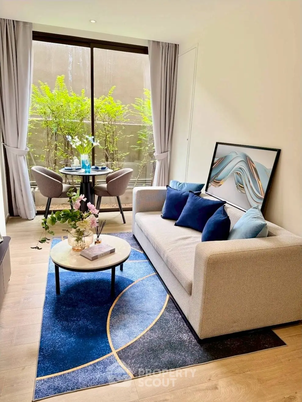 Stylish modern living room with elegant decor and large window view
