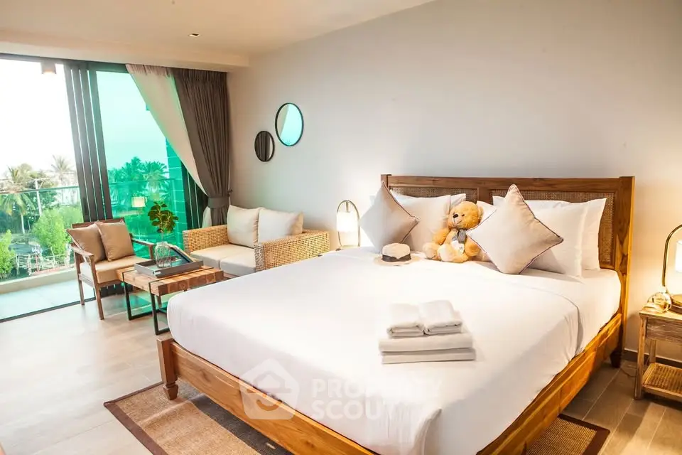 Luxurious bedroom with balcony view and elegant decor