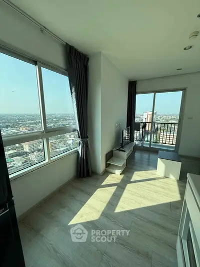 Bright corner unit with panoramic city views and spacious balcony.
