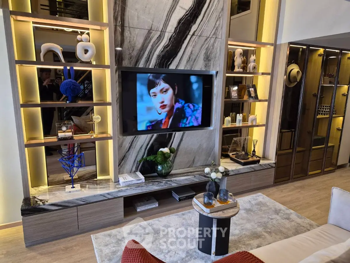 Luxurious living room with modern decor and built-in TV display