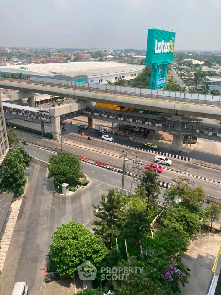 Stunning aerial view of urban landscape with elevated train station and bustling city streets