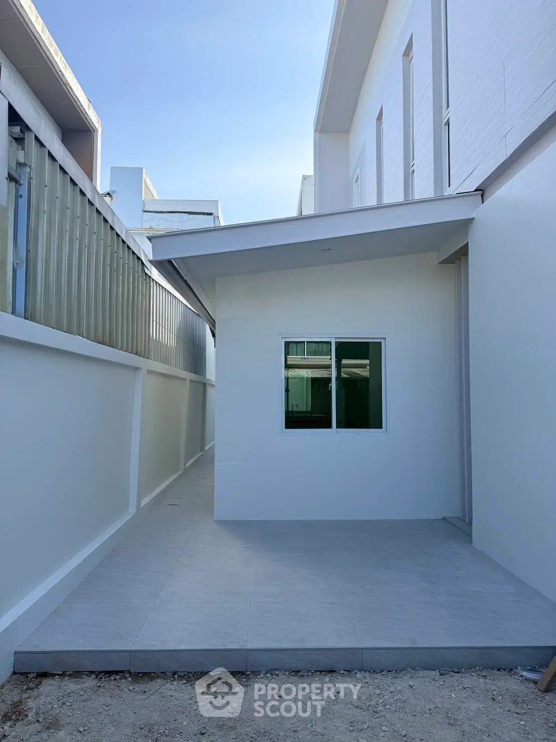 Modern minimalist exterior with clean lines and sleek design, perfect for urban living.