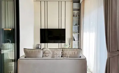 Modern living room with sleek TV setup and elegant decor