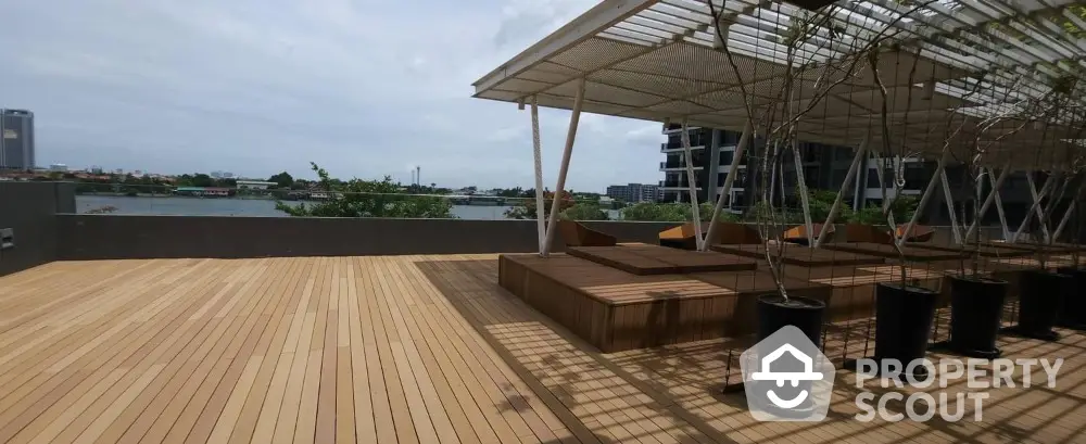 Stunning rooftop terrace with wooden decking and city skyline view