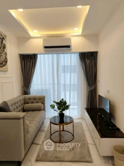 Elegant living room with modern decor and natural light