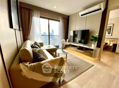 Modern living room with city view, stylish decor, and cozy seating area in a high-rise apartment.