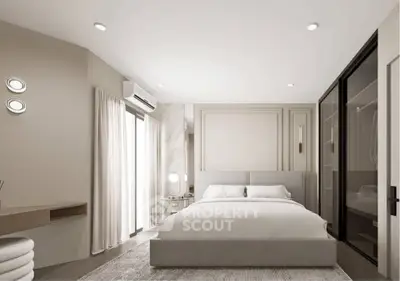 Modern bedroom with sleek design and ample natural light