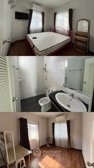 Cozy bedroom with wooden flooring, modern bathroom, and bright study area in a stylish apartment.