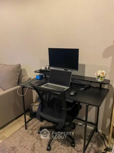 Modern home office setup with sleek desk and comfortable chair