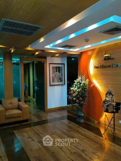 Modern office lobby with stylish decor and wooden flooring