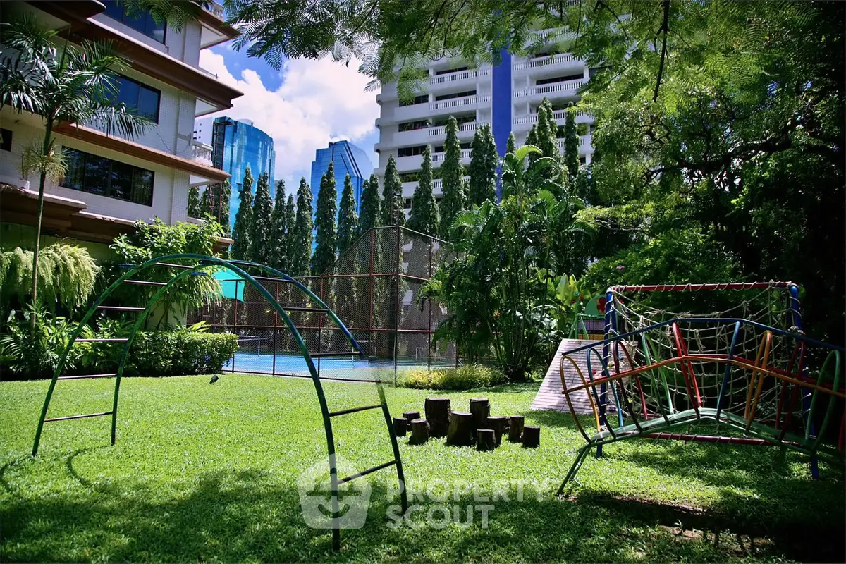 Luxurious garden with playground and pool in upscale residential complex
