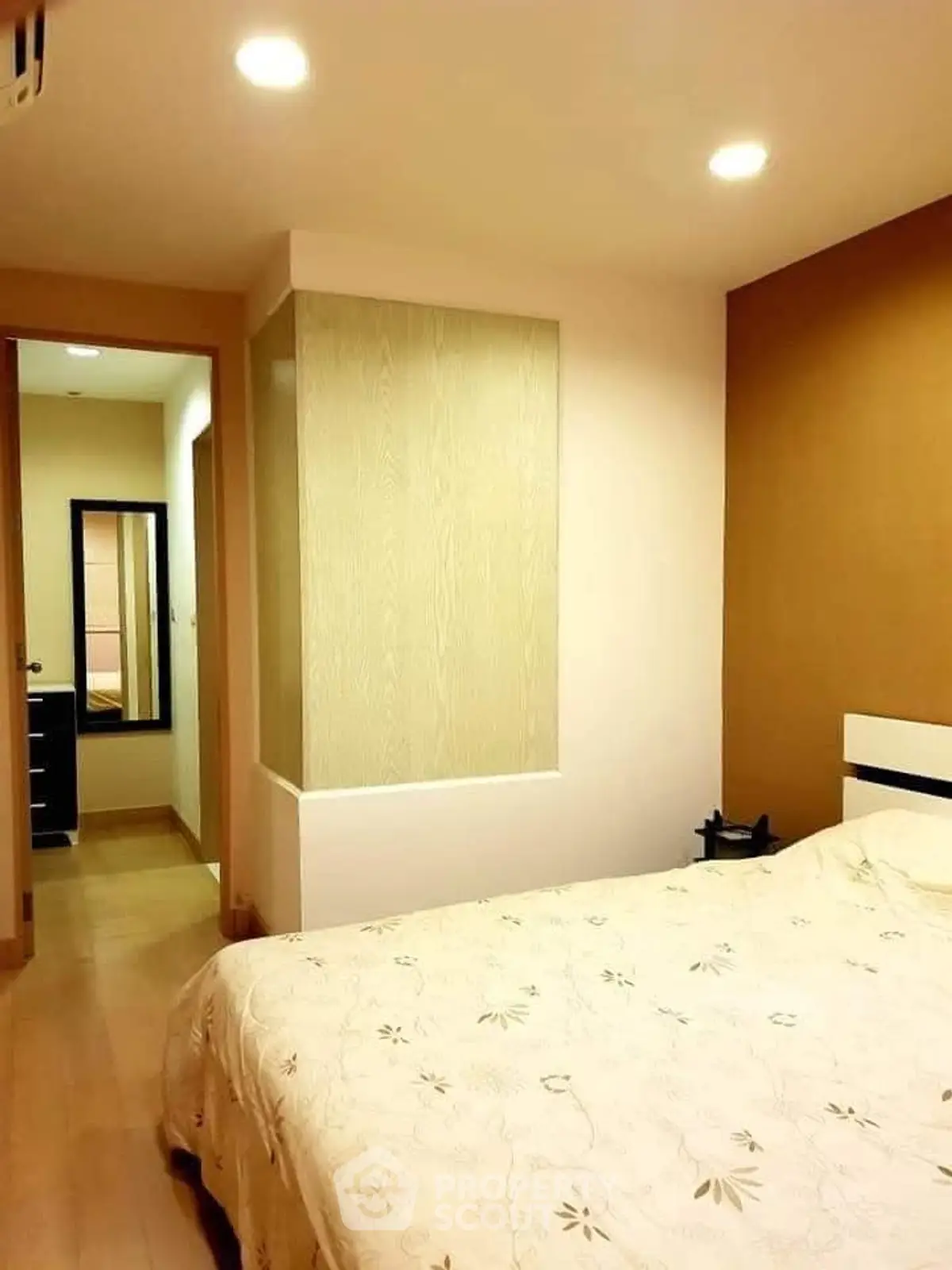 Cozy bedroom with warm lighting and modern decor