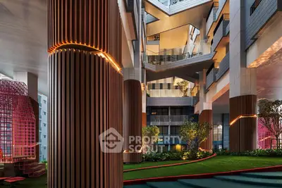 Stunning modern building interior with lush greenery and unique architectural design.