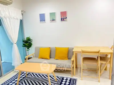 Charming living room with modern decor, cozy sofa, and dining area, perfect for urban living.