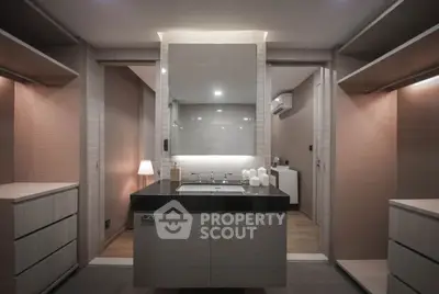 Modern bathroom with sleek design and ambient lighting