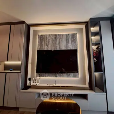 Modern living room with sleek TV setup and ambient lighting