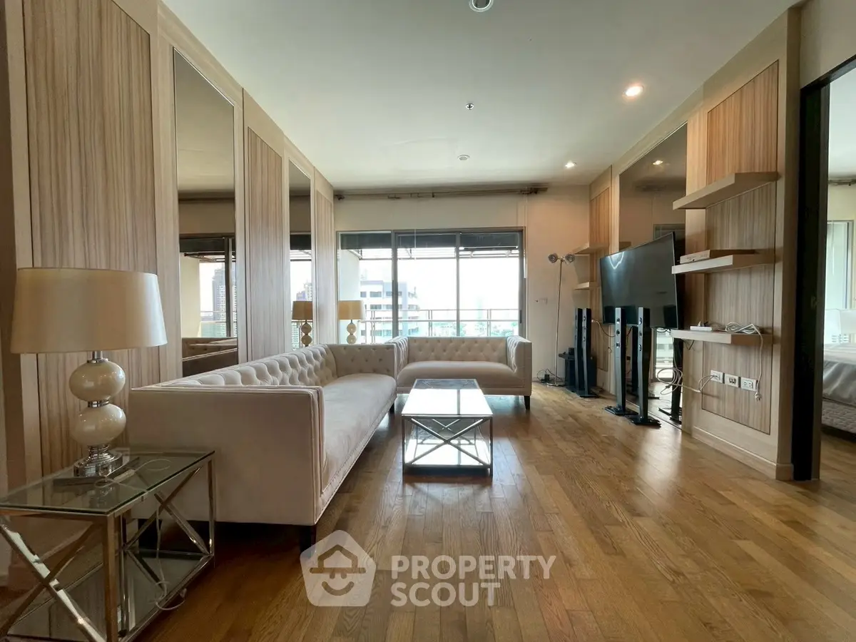 Spacious modern living room with elegant decor and large windows