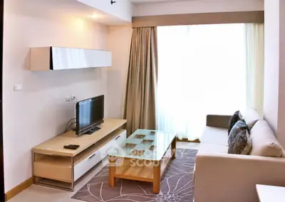 Modern living room with stylish furniture and natural light