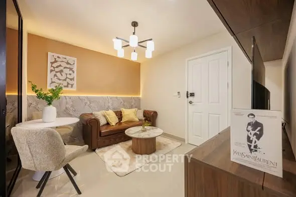 Stylish living room with modern decor and cozy seating area, perfect for relaxation and entertainment.