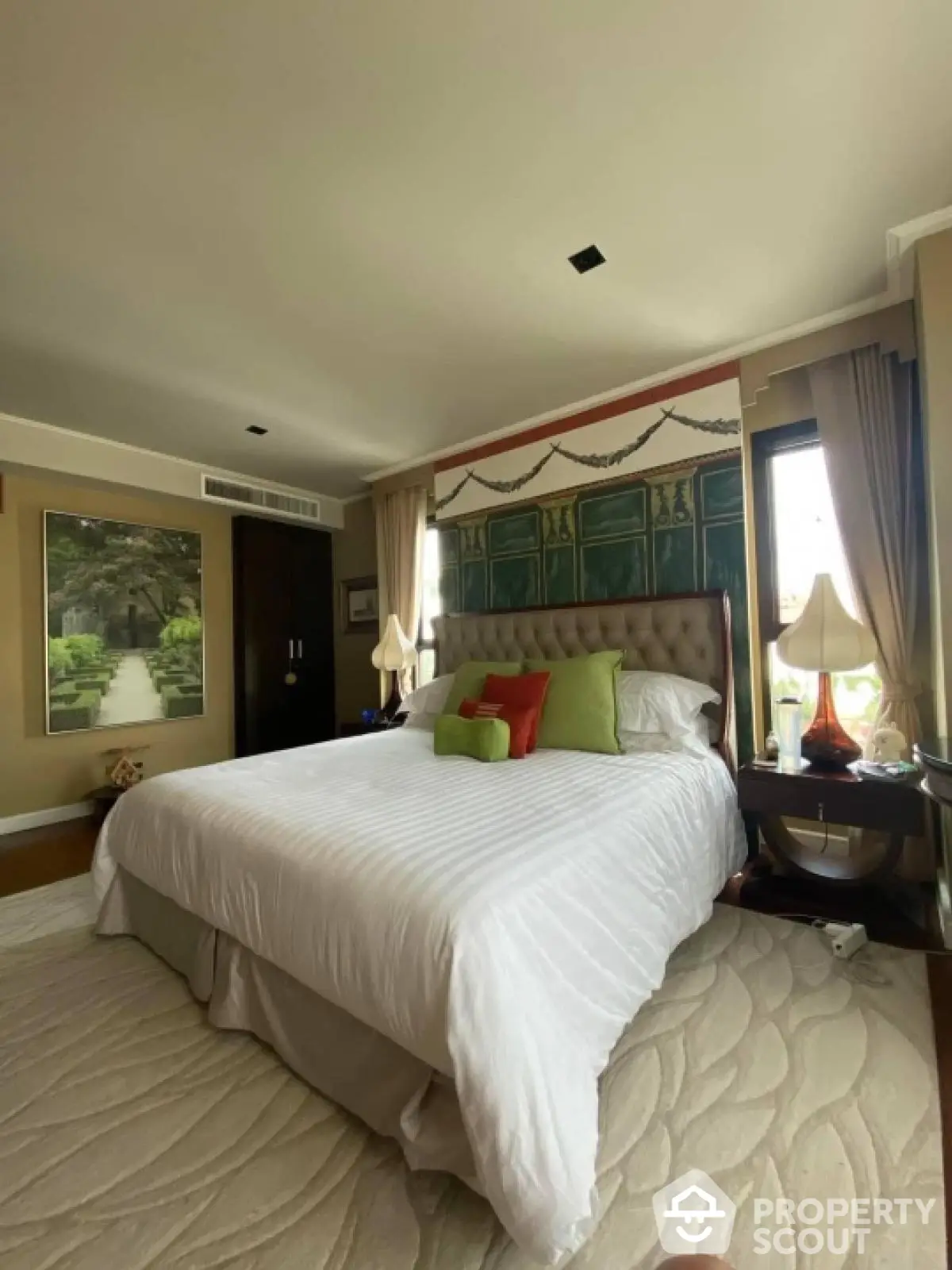 Luxurious bedroom with elegant decor and large bed in upscale property