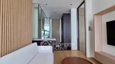 Modern living room with sleek design and wooden accents