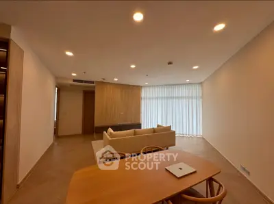 Spacious modern living room with elegant furniture and natural light