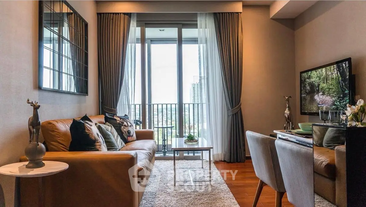 Stylish living room with modern decor and balcony view in urban apartment