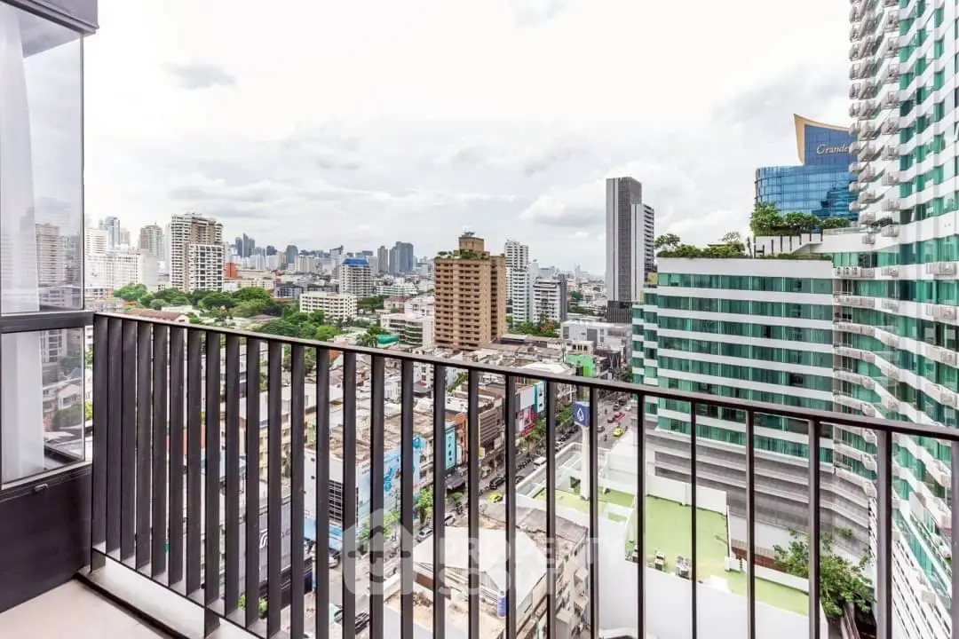 Stunning cityscape view from a high-rise balcony, perfect for urban living enthusiasts.