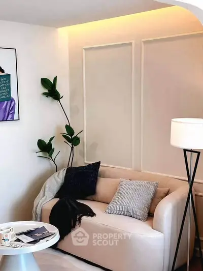 Stylish modern living room with cozy sofa and elegant decor