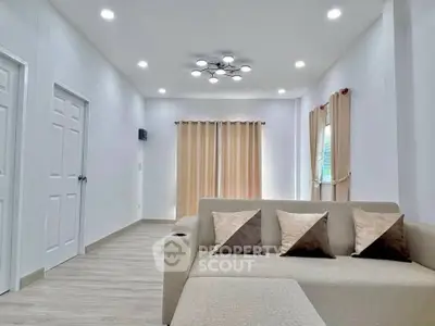 Modern living room with elegant lighting and neutral decor