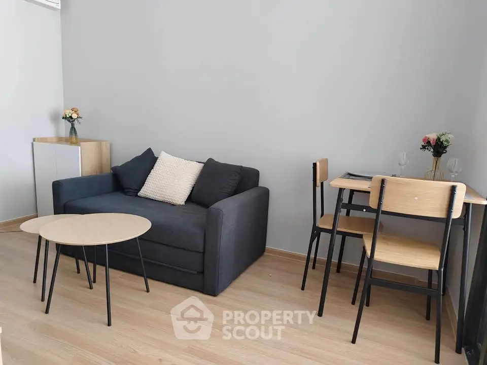 Modern living room with sleek furniture and minimalist decor, perfect for urban living.