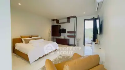 Luxurious bedroom with modern decor and natural light